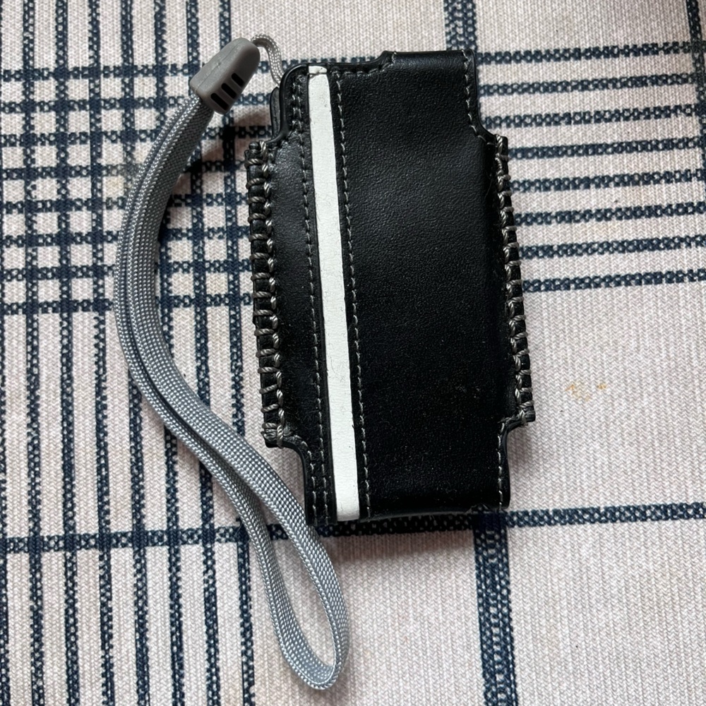 Black and White credit card wallet with wrist strap/clip on
